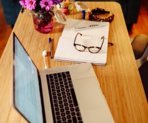 Laptop Glasses And Vase - Specialist Accounting Solutions
